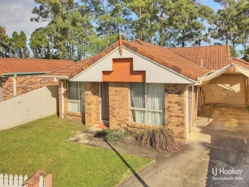 MODESTLY PRICED FOUR BEDROOM HOME IN QUIET CUL DE SAC