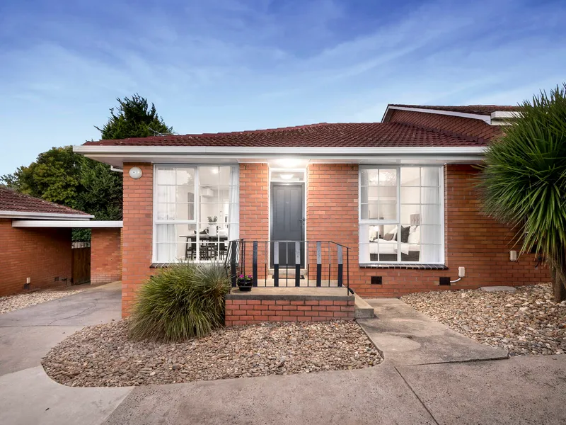 A quiet rear villa unit with renovated appeal