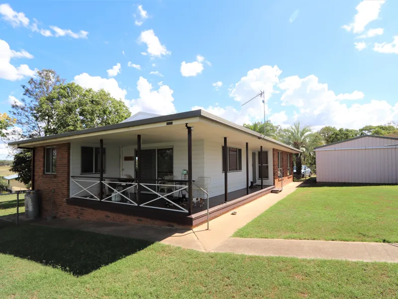 BRICK HOME with room for a horse