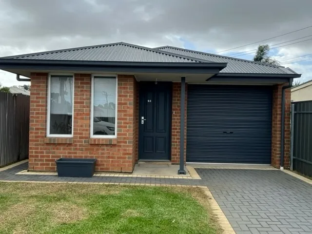 LOW MAINTENANCE CONTEMPORARY HOME