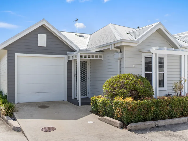Put simply, easy care villa with a touch of Hamptons style