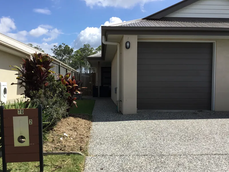 2 BEDROOM DUPLEX WITH FULLY FENCED REAR YARD AND OUTDOOR ENTERTAINMENT AREA