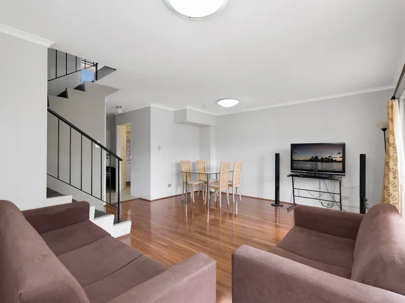 AUCTION IF NOT SOLD PRIOR-Conveniently Located Low Maintenance Townhouse-GUIDE 590000