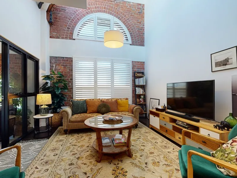 Harbour View Heritage Penthouse Apartment with Exposed Brickwork