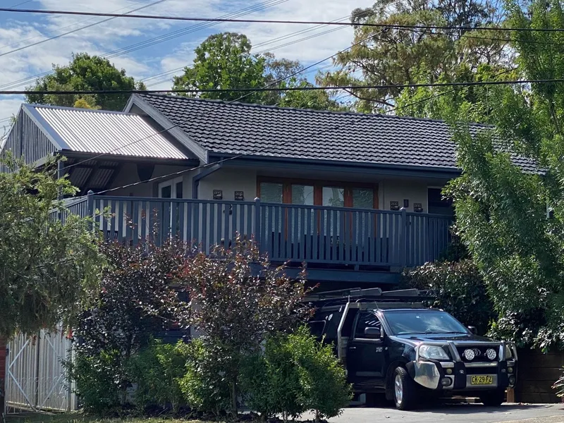 Private home with established gardens boasting huge outdoor entertainment areas.