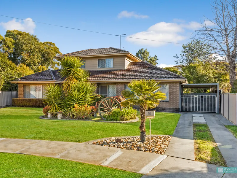 Delightful family home plus large workshop in blue chip locale