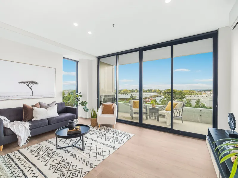 Modern two-bedroom apartment plus study with tranquil river views