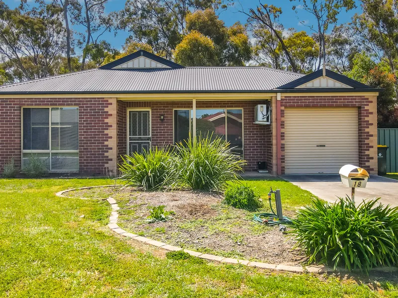 Low Maintenance home with Side Access and Backing onto Bushland.
