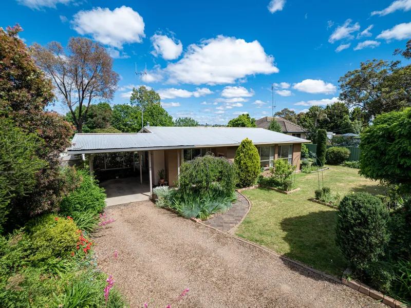 3 Bedroom brick home set in huge private gardens