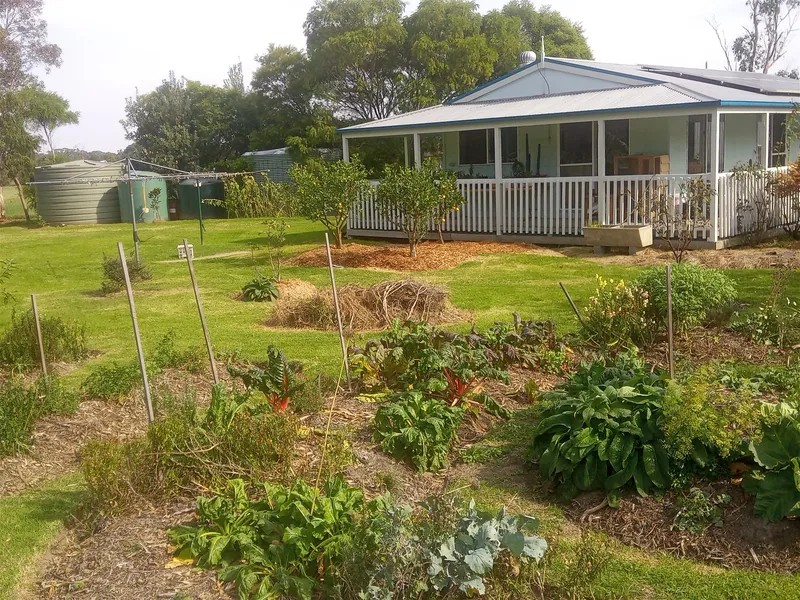 Beautiful Permaculture property, 4 Acres of Gardens, lots of living space, guest accommodation and potential income