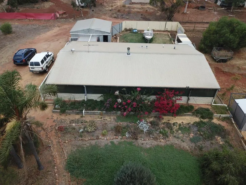 Comfortable home on elevated 1/4 ac