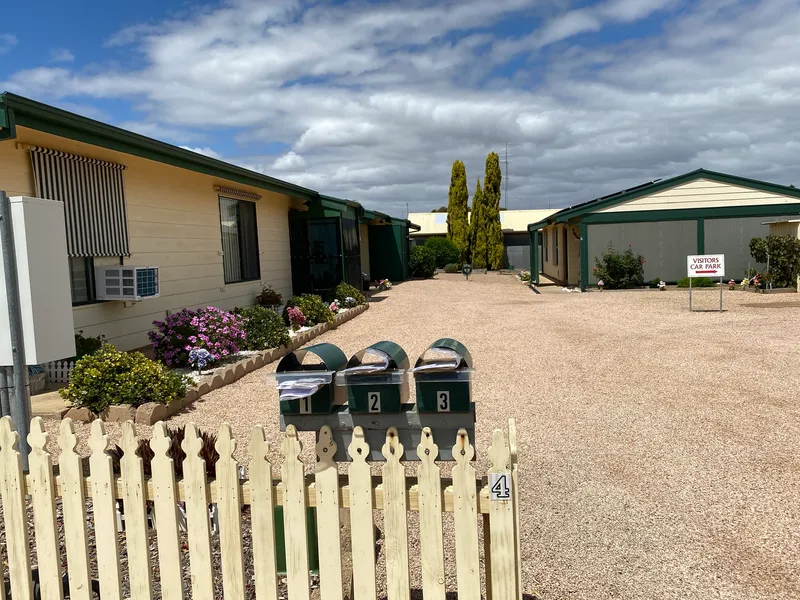 COMFORTABLE TWO BEDROOM UNIT IN QUIET GROUP OF THREE