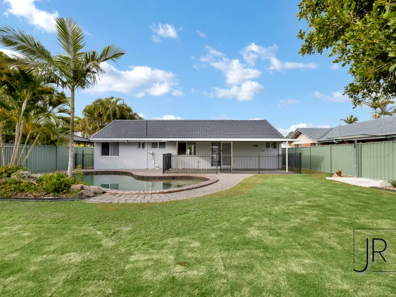 Renovated single level home with sparkling pool