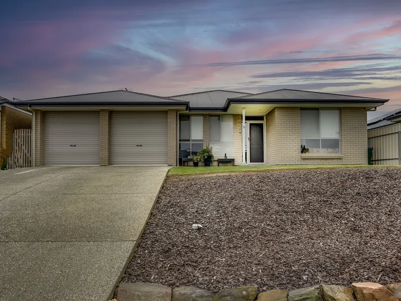 ALMOST NEW...AND SUPERBLY ESTABLISHED