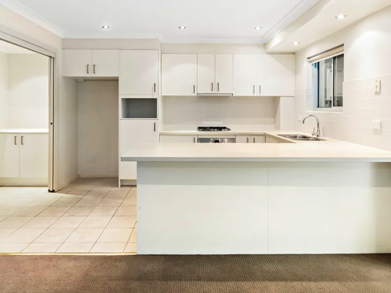 LARGE GROUND FLOOR UNIT CLOSE TO ALL AMENITIES