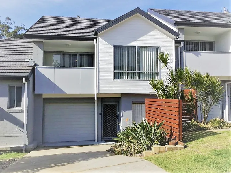 Modern three bedroom air conditioned townhouse