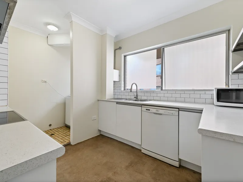 Spacious Two-Bedroom Unit: Prime Location Near Parramatta CBD, Transport, and Amenities