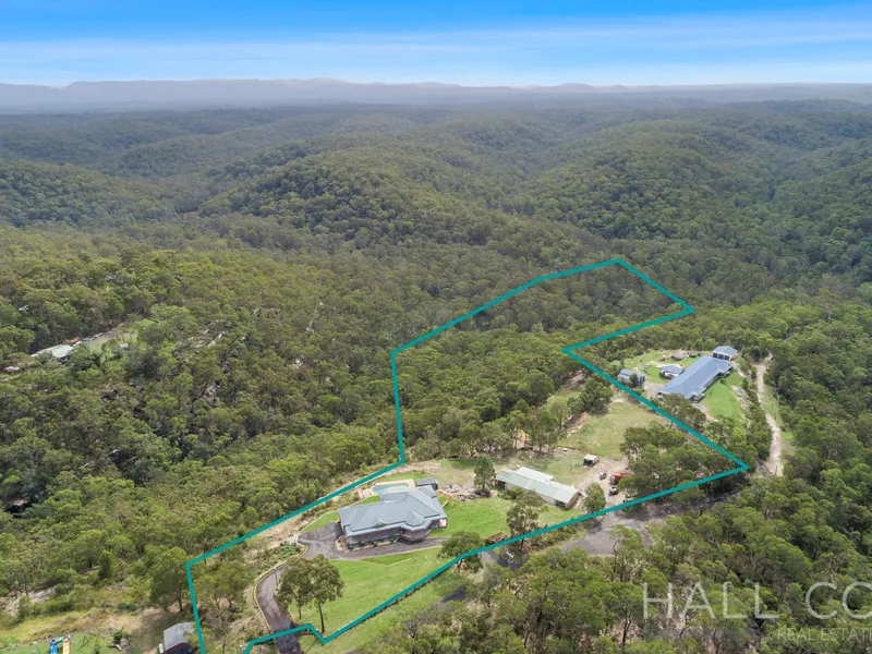 This is it, Over 10 Acres with Uninterrupted Grandstand Views!