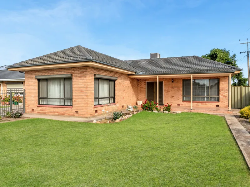 A Cream Brick Classic On A Commanding Corner Allotment