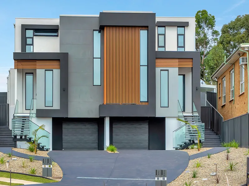 STYLISH BRAND NEW MODERN, LOW MAINTENANCE DUPLEX!