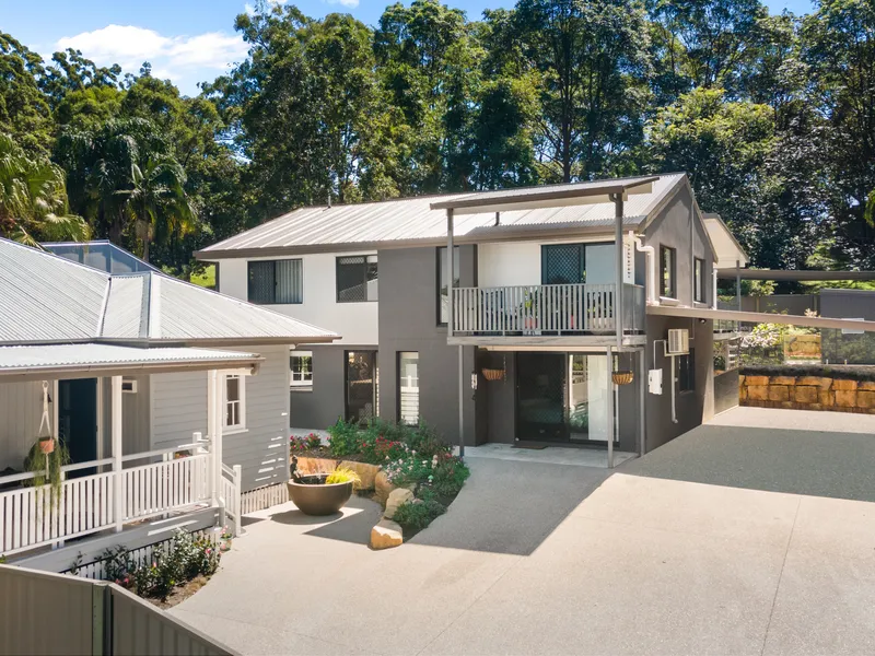 TWO STUNNING HOMES OFFERING DUAL LIVING IN MAIN HOME. MASSIVE POOL & SPA. BIG BLOCK.