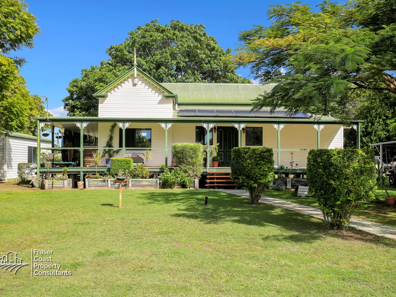 OPPORTUNITY KNOCKS!..... A CHARMING FEDERATION STYLE QUEENSLANDER DRENCHED IN HISTORY & LOVED by GENERATIONS!
