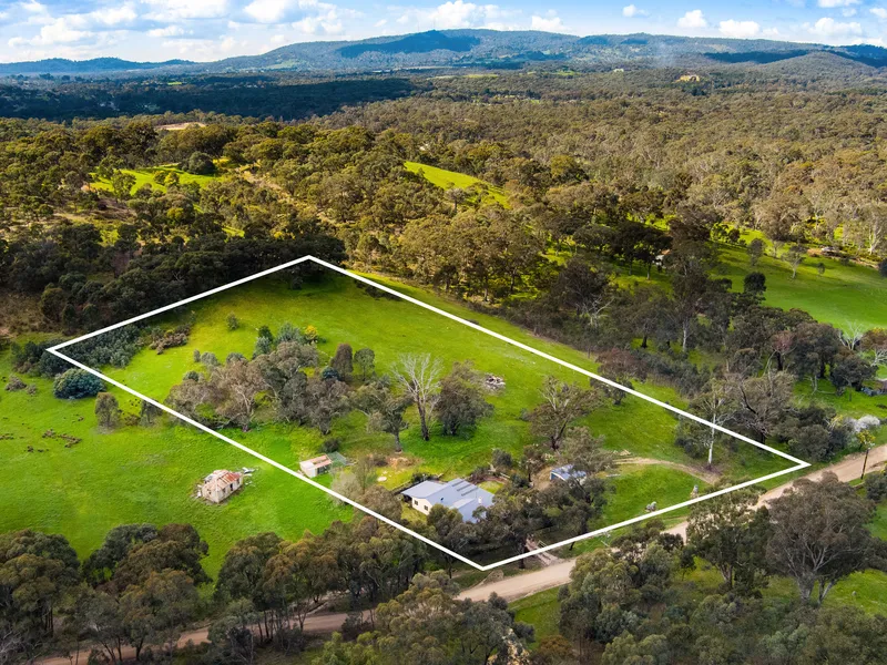 Country cottager dreamer on 3.5 acres, picturesque rural setting so close to town.