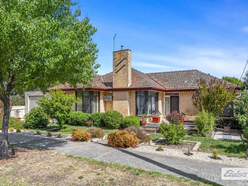 Centrally Positioned Brick Veneer Home
