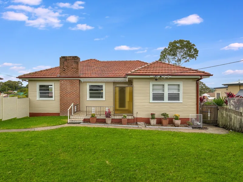 Neat as a Pin on a Valuable Corner Parcel