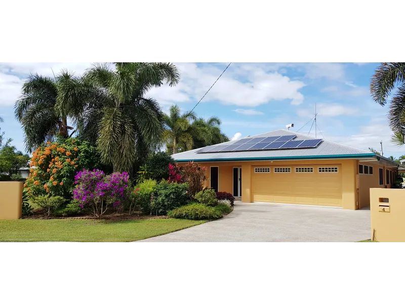 As new 4 bedroom, 2 bathroom beachside executive home with a large garage and a large shed