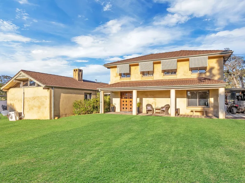 Relaxed Acreage Lifestyle - Renovate or Rebuild!