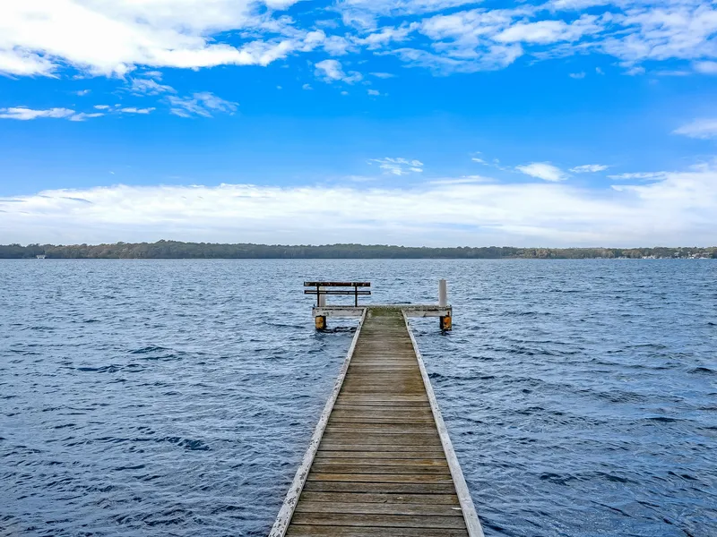 Absolute waterfront on Lake Macquarie with sensational views, boat shed and jetty.
