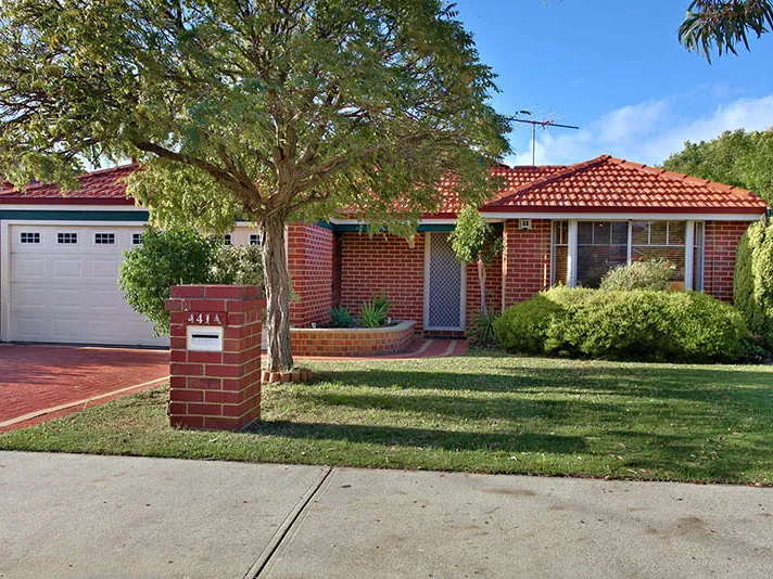 CHARMING SUBURBAN HOME