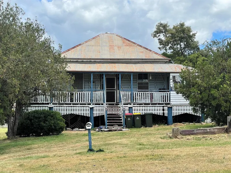 Like Queenslanders then this may be for You - Affordable Classic Queenslander Looking for Someone to Renovate back to it's Former Glory Set on Large 2