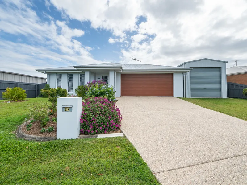 Immaculate family home with high clearance shed!