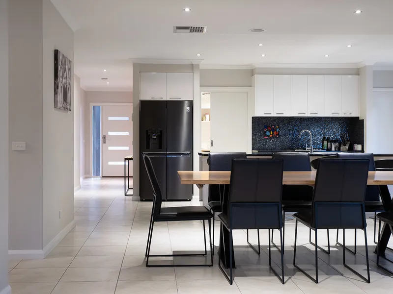 GRAND ENTERTAINER SHINES BRIGHT ON TOPAZ AVENUE Features 4 Bedrooms, 3 Bathrooms, great living spaces with an oversize garage!