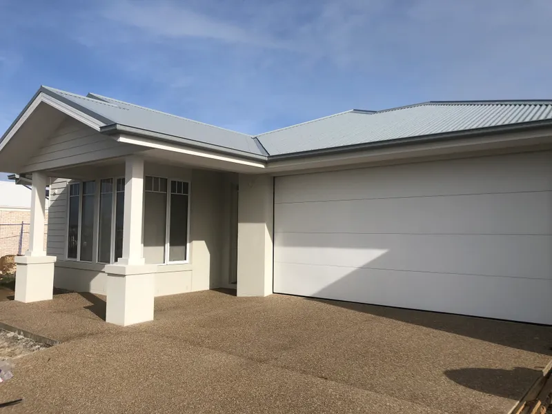 BRAND NEW FOUR BEDROOM AND TWO LIVING FAMILY HOME