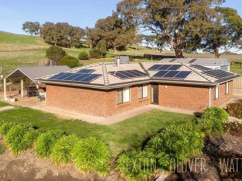 Family home with panoramic views and quality pastural land.