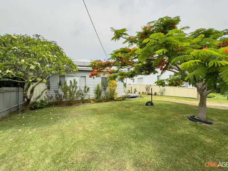A lovely 3 bedroom home with beautiful gardens, a rear deck and spa plus a self contained studio.