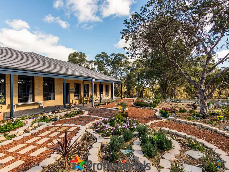 Secluded acreage with unique & versatile home