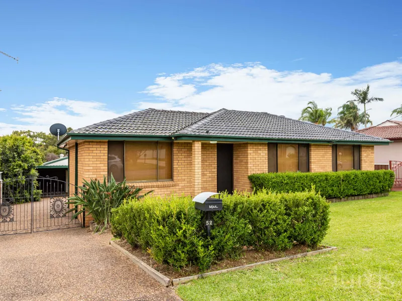 BRICK, POOL & HUGE GARAGE!