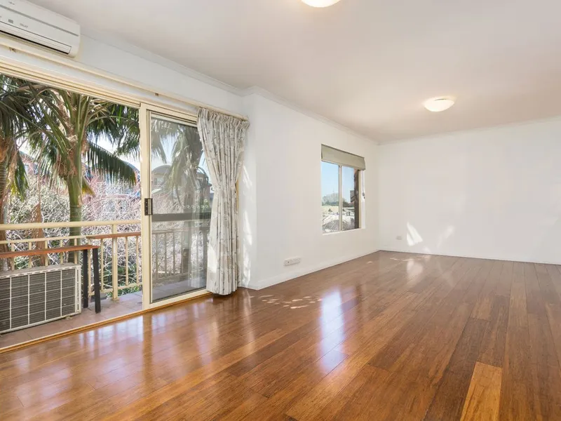 Split level two bedroom apartment offering two car spaces!