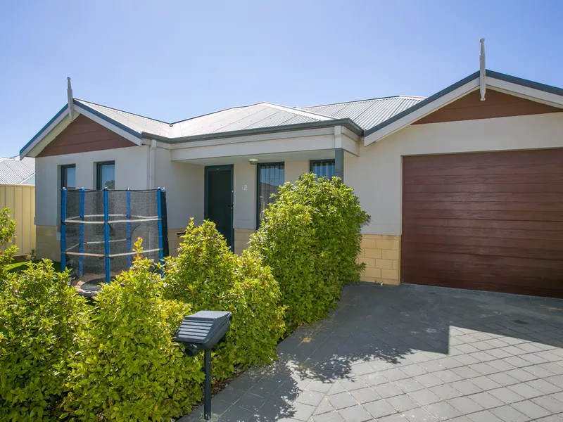 Large kitchen, two bathrooms, light-filled living space.