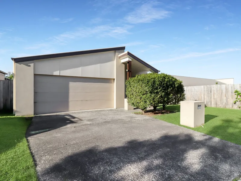 Beautifully presented 4 Bedroom home with an Extra Large Living Area