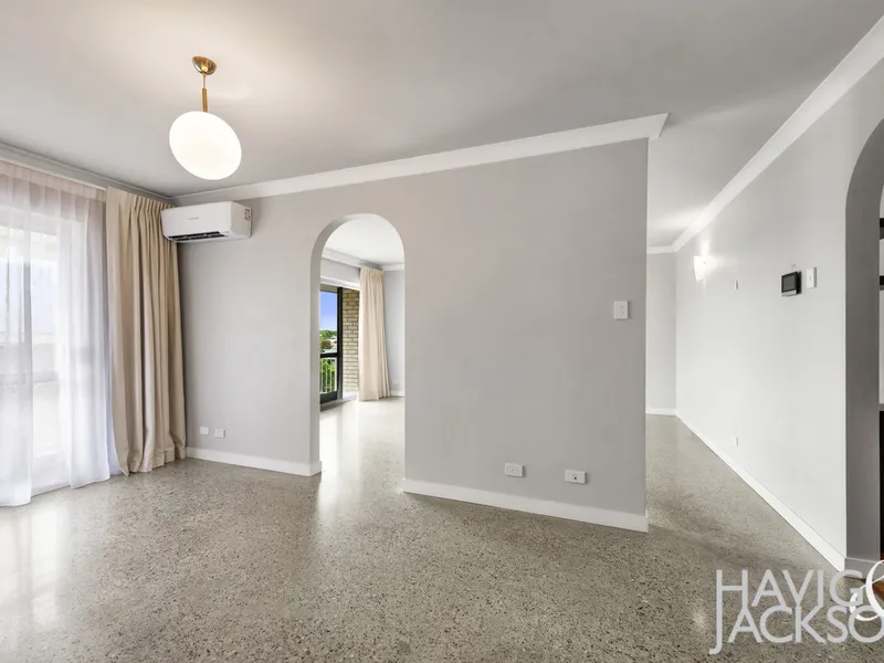 SPACIOUS TOP FLOOR LIVING IN SECURE CLAYFIELD COMPLEX