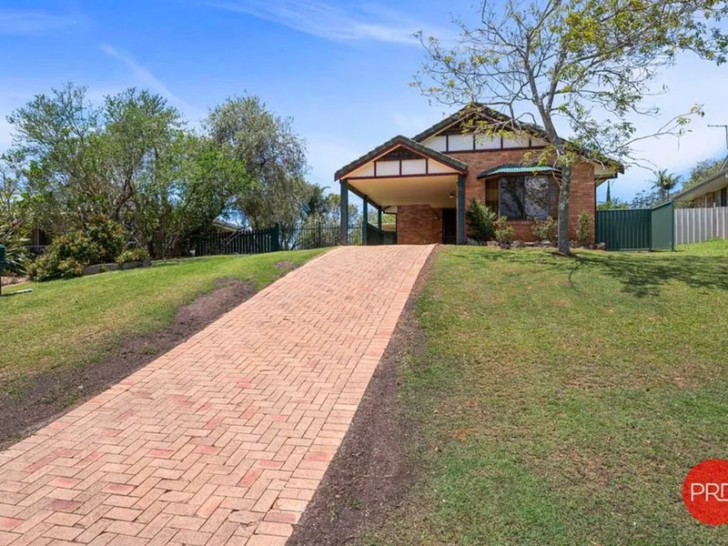 Fantastic home in quiet street with huge level yard and undercover entertaining space