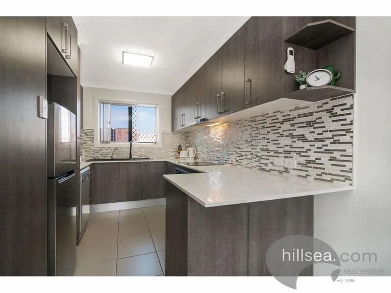 IMMACULATELY RENOVATED UNIT - PRIME LOCATION - WALK TO THE BROADWATER