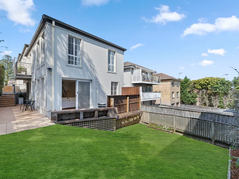 A Light-Filled Dual Level Townhouse in a Blue Ribbon Community