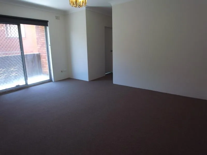 UPDATED TWO BEDROOM APARTMENT IN GREAT LOCATION WITH PARKING