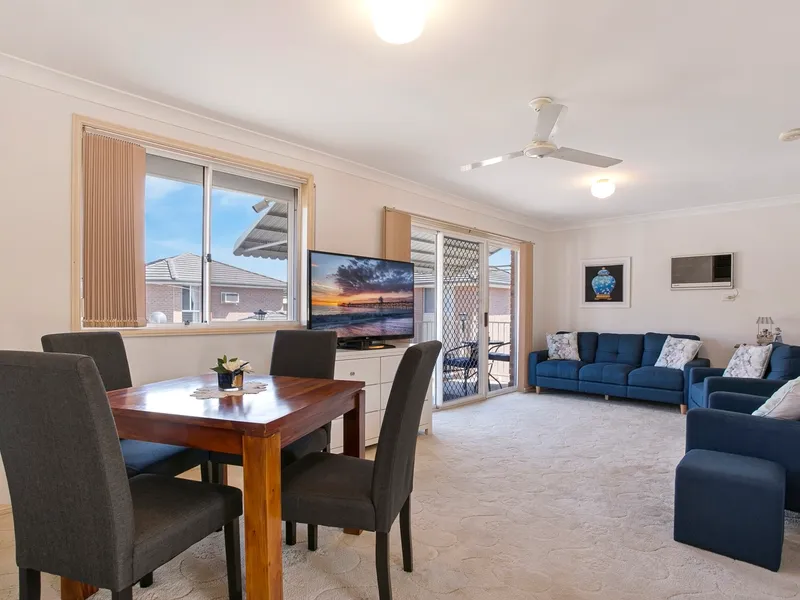 Upstairs OVER 55'S unit + balcony with views